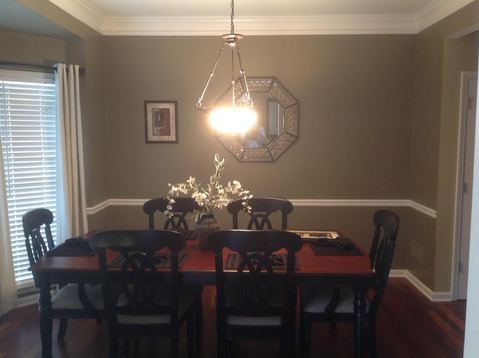Contemporary Dining Room with traditional dining table