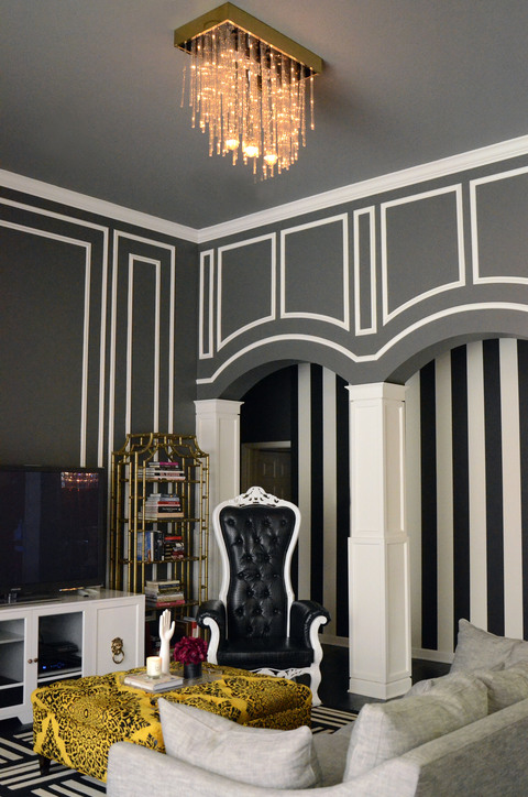 Eclectic Family Room with white and black throne chair