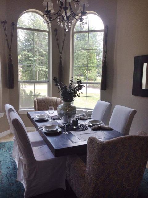 Transitional Dining Room with slip covered dining chair