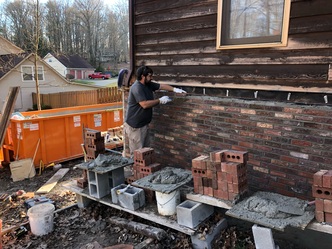 Garrett & Sons Masonry logo