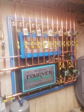 Logo for Fournier Plumbing and Heating - Inicio Facebook