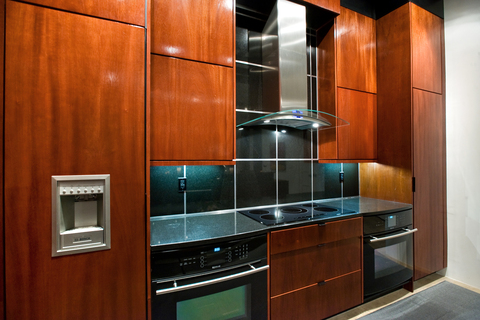 Modern Kitchen with stainless steel and glass vent hood