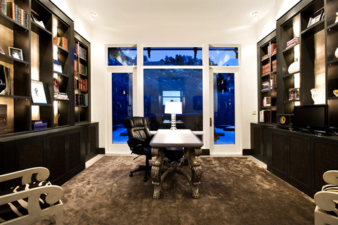 Contemporary Library with black rolling office chair