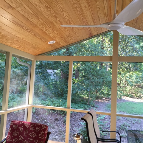 Contemporary Sunroom with propeller style ceiling fan and light