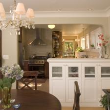 Traditional Dining Room with custom cabinet storage unit