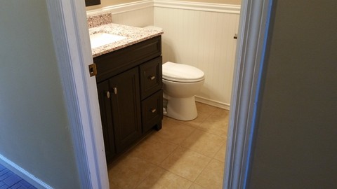 Cape Cod Bathroom with white bead board walls