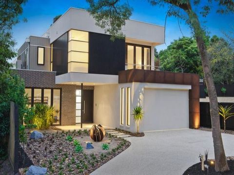 Contemporary Home Exterior with front load garage