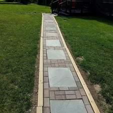 Tim's Lawn Care logo