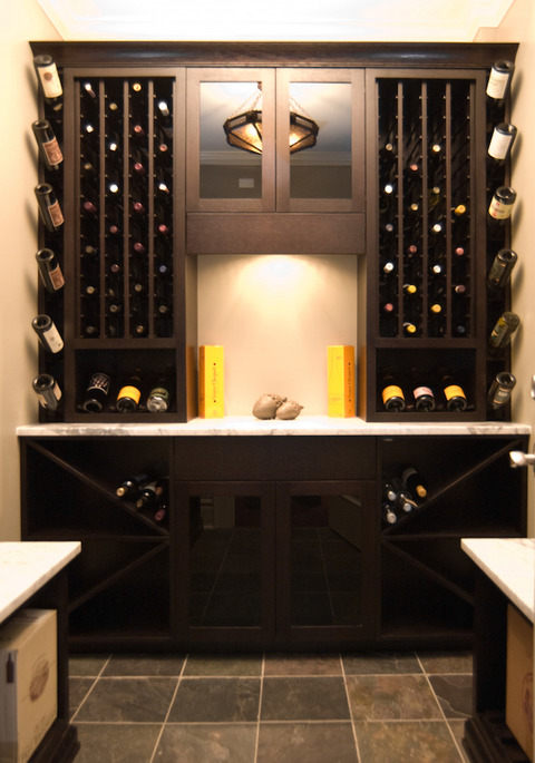 Contemporary Wine Cellar with dark wood wine cellar storage