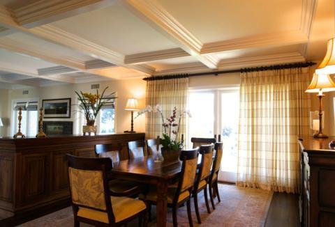 Transitional Dining Room with upholstered dining chairs