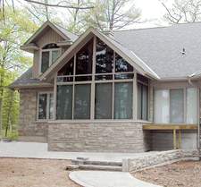Custom Sunrooms & Home Improvements logo