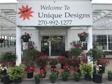 Unique Designs Nursery & Landscaping logo