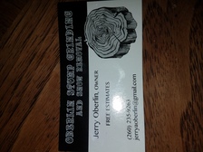Logo for Oberlin's Stump Grinding and Snow Removal