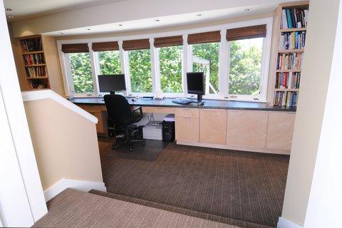 Contemporary Home Office with grey striped wall to wall carpet