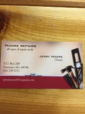 Moore Repairs logo
