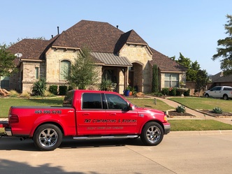 TNT Contracting and Roofing logo