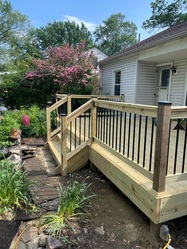 RJ Landscaping  & Design logo