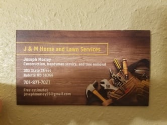 J and M Home and Lawn Services logo