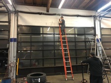 Logo for Urgent Garage Doors