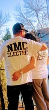 NMC Electric logo