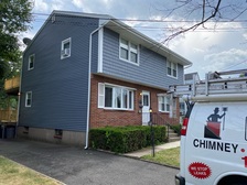 Anytime Roofing and Chimney logo