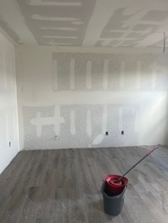 JT Drywall logo