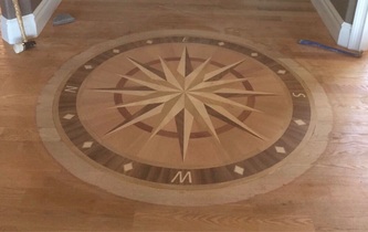 Reis wood floors LLC  logo