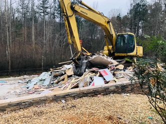 JJ Hauling & Demolition logo