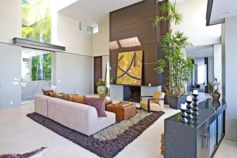 Modern Living Room with dark brown wood wall covering