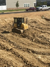 Haywood Grading and Excavating logo