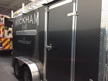 Wickham Construction, LLC logo
