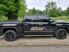Adkins Home Improvement logo