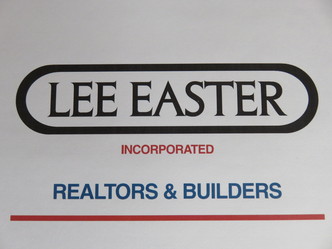 Lee Easter, Inc., Realtors & Builders logo