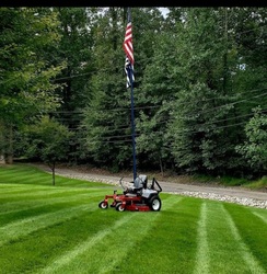 H.T.M Lawn Service & Landscape logo
