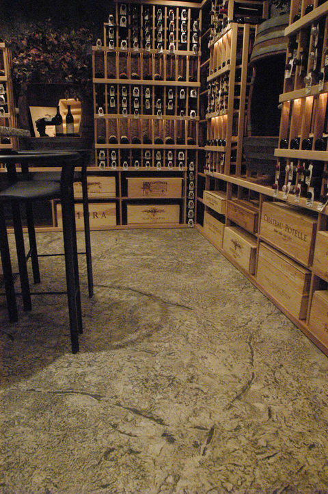 Traditional Wine Cellar with stamped concrete floor
