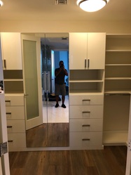 Paul's Wood Closets logo