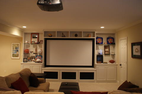 Traditional Home Theater with white crown molding