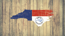 Carolina Unlimited Construction logo