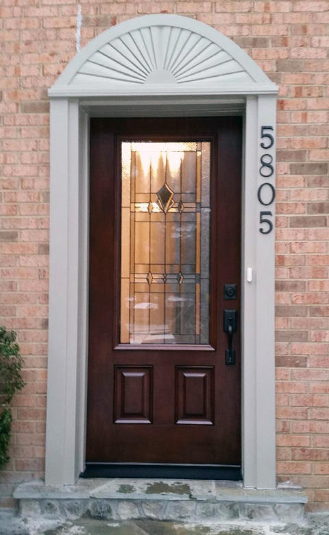 Modern Home Exterior with stained glass door insert