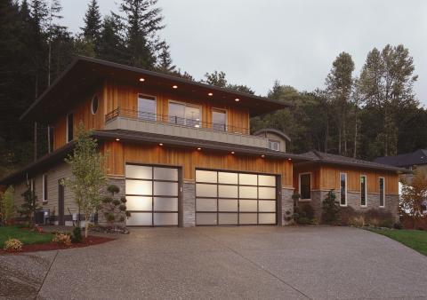 Modern Home Exterior with light gray cobblestone siding
