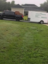 Juan's Lawncare and Landscaping logo