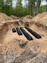 Logo for NRE Excavating