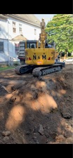 N&M Excavating logo