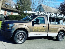 Premium Exteriors, LLC logo