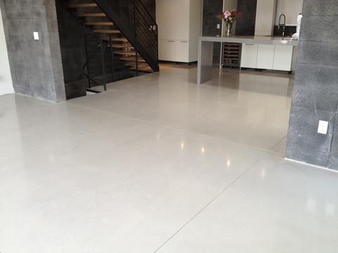 Modern Dining Room with white epoxy concrete floor