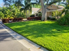 Logo for Kremer Landscaping, LLC