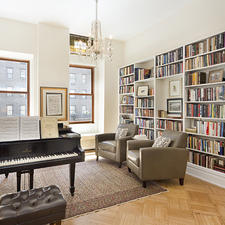 Transitional Library with crystal chandelier lighting