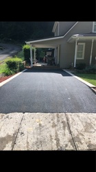 Lester's Paving and Sealing logo