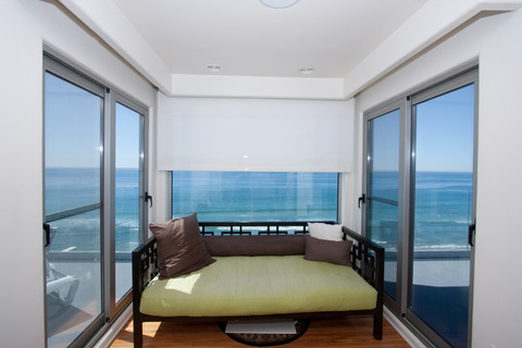 Contemporary Sunroom with sliding glass patio doors