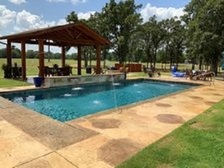 Logo for Liquid Oasis Custom Pools Spas and Service